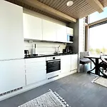 Huoneisto Naava Loft - Kaksikerroksinen Lasiseinähuoneisto Järvinäköalalla